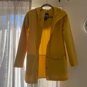 Yellow North Face rain jacket